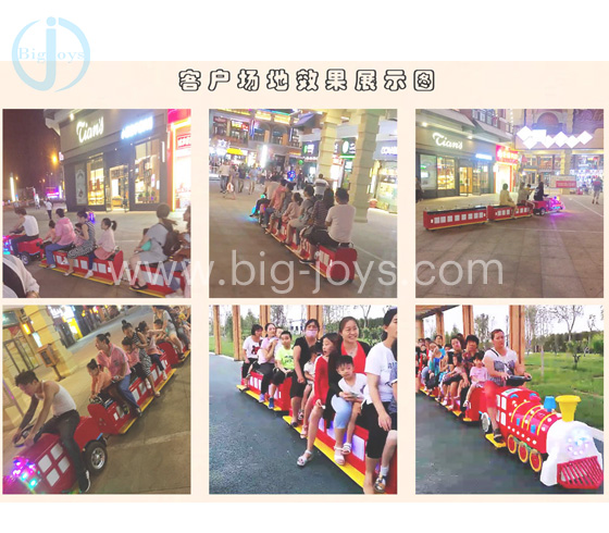 Children sit on electric train